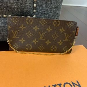SOLD Louis Vuitton Pocket Pouch GM